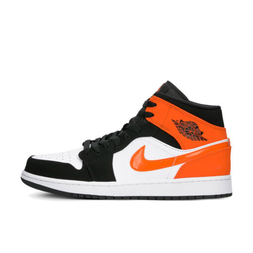 Кроссовки Nike Air Jordan 1 Mid OG Shattered Backboard 554724-058 бело-чёрные с оранжевым - фото 1