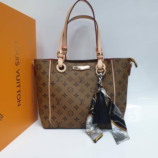 Женская кожаная сумка Louis Vuitton коричневая 28/24/16 - фото 1