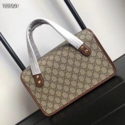 Женская кожаная сумка Gucci с рисунком и коричневыми вставками 28/17 см