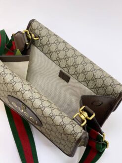 Женская сумка Gucci из канвы с кожаной окантовкой 30/21 см